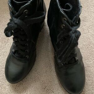 Women’s Black Leather Combat Boots.